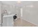 Spacious laundry room with washer, dryer, and water heater at 309 Penn Oak Cir, Raleigh, NC 27615