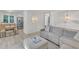 Open-concept living space with a dining area, comfortable seating, and stainless steel appliances at 309 Penn Oak Cir, Raleigh, NC 27615