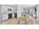 An open floor plan view showcasing both the kitchen and living room at 309 Penn Oak Cir, Raleigh, NC 27615