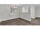 Dining room featuring new flooring, fresh paint, updated lighting at 313 W Church St, Angier, NC 27501