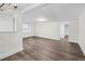 Bright and airy living room with fresh paint, hardwood floors, and large windows at 313 W Church St, Angier, NC 27501