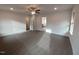 Large bedroom with neutral walls, neutral carpet, a ceiling fan, and natural light at 315 New Twin Branch Ct, Smithfield, NC 27577