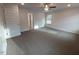 Spacious bedroom with a ceiling fan, carpet flooring, and natural light at 315 New Twin Branch Ct, Smithfield, NC 27577
