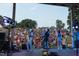Outdoor concert with a band performing on stage to a large crowd in an amphitheater at 315 New Twin Branch Ct, Smithfield, NC 27577