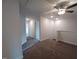 Upstairs hallway with carpeting, ceiling fan, and neutral paint at 315 New Twin Branch Ct, Smithfield, NC 27577