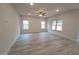 Spacious living room with recessed lighting, ceiling fan, and multiple windows at 315 New Twin Branch Ct, Smithfield, NC 27577
