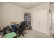 Bedroom featuring neutral walls, carpet flooring, closet, and a black office desk with chair at 320 Trout Valley Rd, Wake Forest, NC 27587