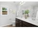 Elegant bathroom featuring double vanity, modern fixtures, and a separate glass-enclosed shower at 34 Schoolhouse Way, Clayton, NC 27520
