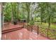 Inviting backyard with an expansive deck, perfect for outdoor entertaining and relaxing with views at 3420 Greenville Loop Rd, Wake Forest, NC 27587