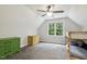 Spacious bedroom featuring colorful furniture, large windows, and cozy bunkbeds at 3420 Greenville Loop Rd, Wake Forest, NC 27587