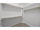 Walk-in closet features wall to wall shelves for easy storage at 3465 Covington Trl, Mebane, NC 27302