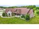 Beautiful one-story home with a manicured lawn and mature landscaping at 3465 Covington Trl, Mebane, NC 27302