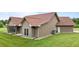 Rear exterior with a screened-in porch and outdoor access at 3465 Covington Trl, Mebane, NC 27302