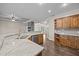 Well-equipped kitchen featuring stainless steel appliances and granite countertops that overlook the living room at 3465 Covington Trl, Mebane, NC 27302