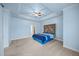 Charming main bedroom with a decorative tray ceiling, recessed lighting, and a serene color palette at 3465 Covington Trl, Mebane, NC 27302