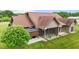 Lovely rear exterior with a screened-in porch and gazebo at 3465 Covington Trl, Mebane, NC 27302
