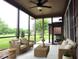 Inviting screened porch featuring comfortable seating and serene outdoor views at 3465 Covington Trl, Mebane, NC 27302