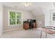 Bedroom featuring neutral carpet, a desk, and natural light at 347 Manchester Trl, Clayton, NC 27527
