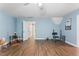 Bonus room with open floor plan, wood floors, and natural light at 347 Manchester Trl, Clayton, NC 27527