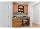 This kitchen features wooden cabinets, built-in shelving, and a breakfast nook at 347 Manchester Trl, Clayton, NC 27527