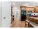This kitchen features wooden cabinets, stainless steel appliances, and a breakfast nook at 347 Manchester Trl, Clayton, NC 27527