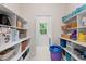 The pantry is well-organized with shelving and ample storage space at 347 Manchester Trl, Clayton, NC 27527