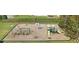 Community playground featuring swings, slides, and climbing equipment for outdoor fun and recreation at 347 Manchester Trl, Clayton, NC 27527