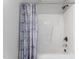 Shower with a full sized tub and patterned shower curtain at 347 Manchester Trl, Clayton, NC 27527