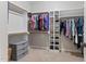 Spacious walk-in closet with shelving and ample storage for shoes and clothing at 347 Manchester Trl, Clayton, NC 27527