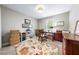 Comfortable office space features carpeted floors, a large window, and an area rug at 4 Barkridge Ct, Durham, NC 27713