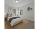 Cozy bedroom with plush bed, stylish decor, and a view to the outside at 4003 Jockey Club Cir, Cary, NC 27519