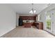 Kitchen showcasing tile floors, a center island, and stainless steel appliances at 4003 Jockey Club Cir, Cary, NC 27519