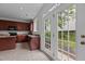 This lovely kitchen features stainless appliances, granite countertops and exterior door access at 4003 Jockey Club Cir, Cary, NC 27519