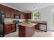 Kitchen featuring granite countertops and stainless steel appliances at 4003 Jockey Club Cir, Cary, NC 27519