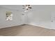 Bright living room features light wood floors, neutral paint, and natural light at 4003 Jockey Club Cir, Cary, NC 27519