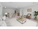 Bright living room with stairs to the second floor and lots of open space at 4003 Jockey Club Cir, Cary, NC 27519
