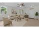 Inviting living room featuring neutral tones, a cozy seating arrangement and lots of natural light at 4003 Jockey Club Cir, Cary, NC 27519