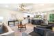 Open concept living room and kitchen with modern light fixtures and stylish decor at 4012 Castle Ct, Raleigh, NC 27613