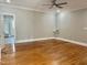Spacious bedroom features hardwood floors, recessed lighting and neutral paint for versatile decorating at 4016 Berman Edge Rd, Holly Springs, NC 27540