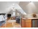 A bonus room with exercise equipment and a kitchenette at 404 Settlecroft Ln, Holly Springs, NC 27540