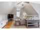 Bonus room with seating and a television at 404 Settlecroft Ln, Holly Springs, NC 27540