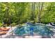 View from deck of gorgeous pool and patio at 404 Settlecroft Ln, Holly Springs, NC 27540