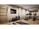 Home gym with exercise equipment including a treadmill, exercise bike, and weights at 404 Shinleaf Pond Trl, Raleigh, NC 27614