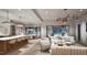 Open-concept living area with kitchen, dining, and living spaces flowing together, perfect for entertaining at 404 Shinleaf Pond Trl, Raleigh, NC 27614