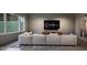 Modern living room with large sofa, television, windows, and a minimalist design at 404 Shinleaf Pond Trl, Raleigh, NC 27614