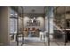 Stylish home office featuring modern desk, glass walls, and ample natural light at 404 Shinleaf Pond Trl, Raleigh, NC 27614