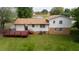 Aerial view of the back of the house with a wooden deck at 409 Ivey Rd, Graham, NC 27253