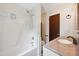 Bathroom featuring shower with tub and updated vanity at 409 Ivey Rd, Graham, NC 27253