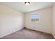 Bedroom featuring neutral walls, carpet and a window view at 409 Ivey Rd, Graham, NC 27253