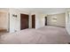 Spacious bedroom with large windows and neutral carpet at 409 Ivey Rd, Graham, NC 27253